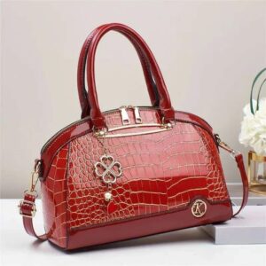 Glossy bowling shaped handbag